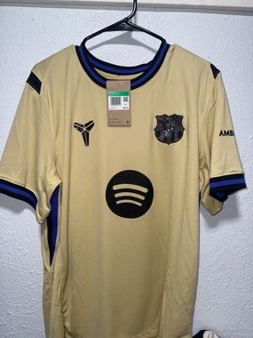 Nike FC Barcelona Men's Short-Sleeve Jersey in Cream with Black & Blue Trim